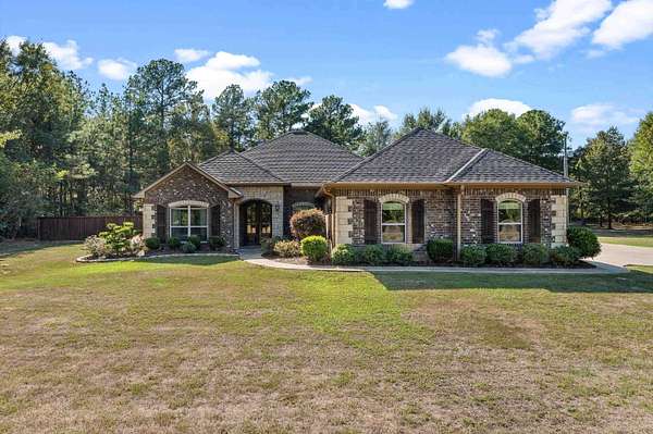 6.23 Acres of Land with Home for Sale in Elysian Fields, Texas