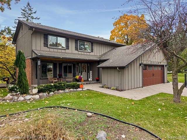 1.5 Acres of Land with Home for Sale in Clinton Charter Township, Michigan