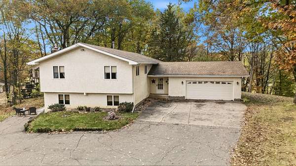 4.44 Acres of Land with Home for Sale in Forest Lake, Minnesota