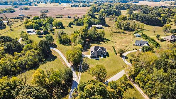 5.5 Acres of Land with Home for Sale in Adams, Tennessee