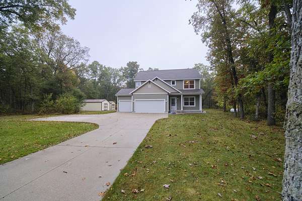 5 Acres of Land with Home for Sale in Manistee, Michigan