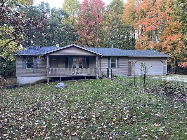 5 Acres of Land with Home for Sale in Irons, Michigan