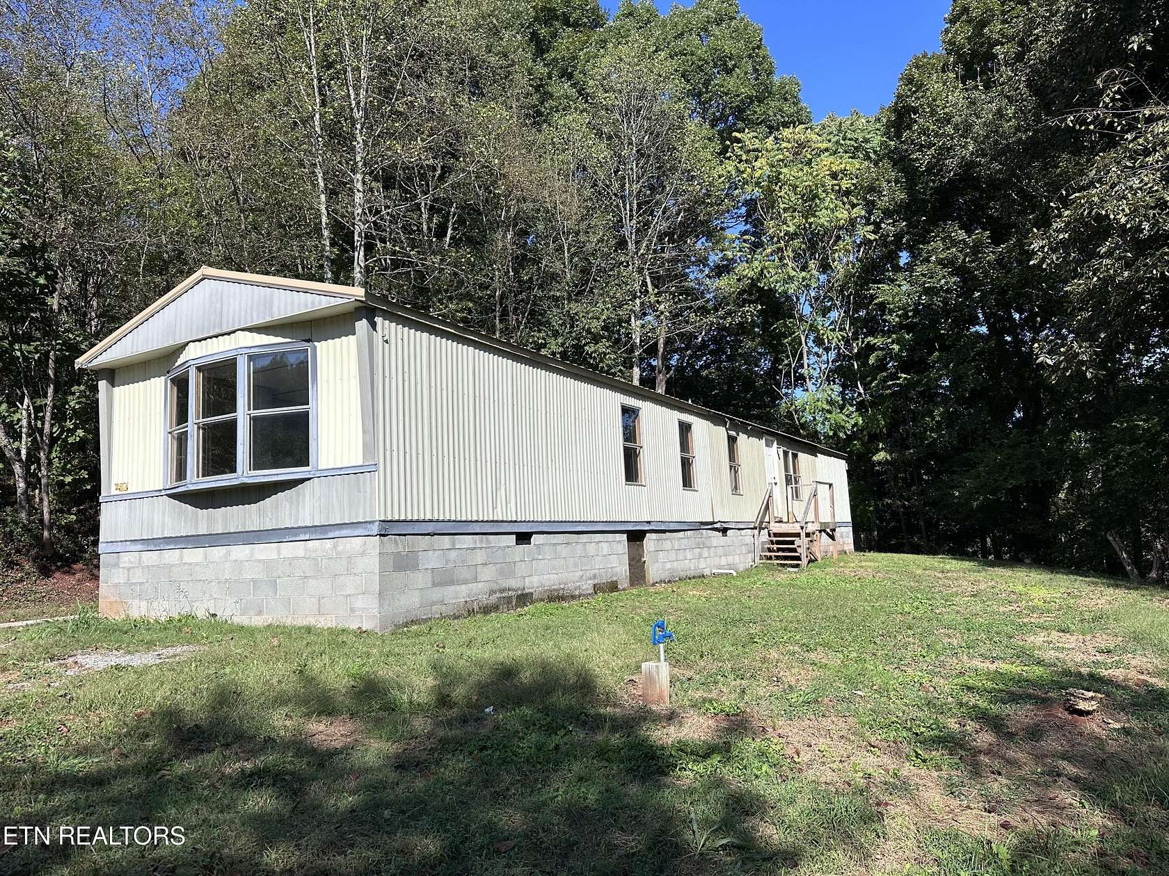1.68 Acres of Land with Home for Sale in Sweetwater, Tennessee