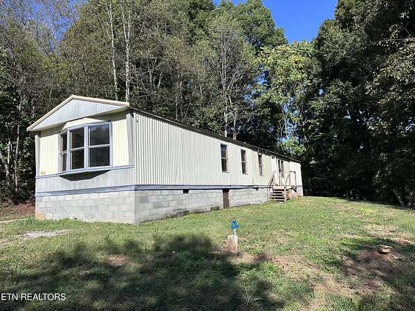 1.68 Acres of Land with Home for Sale in Sweetwater, Tennessee