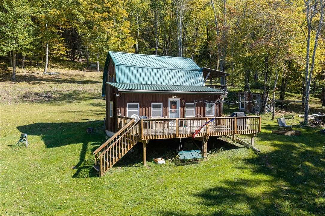 12.4 Acres of Recreational Land with Home for Sale in De Lancey, New York