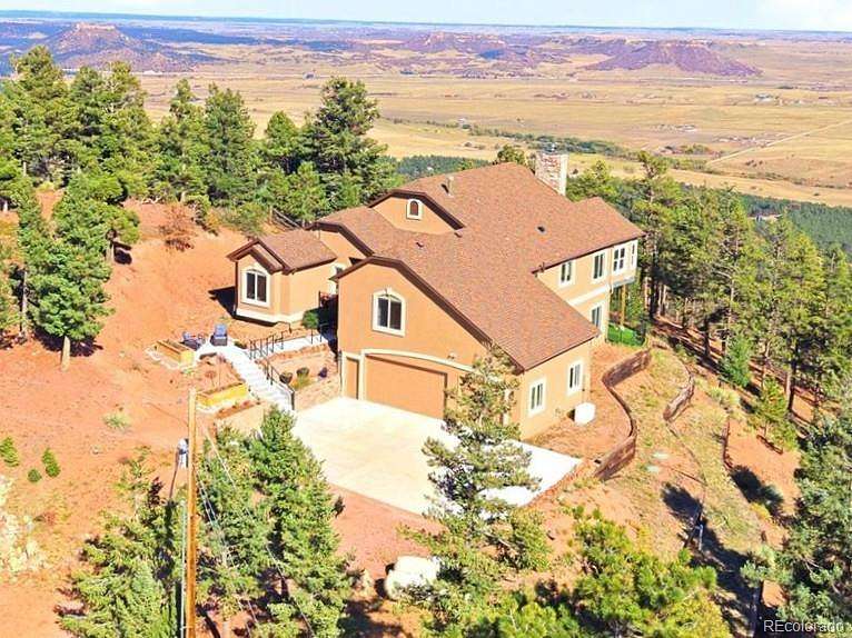 4 Acres of Land with Home for Sale in Larkspur, Colorado