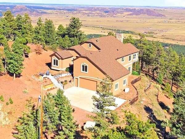 4 Acres of Land with Home for Sale in Larkspur, Colorado