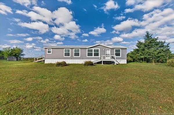 5 Acres of Land with Home for Sale in Nowata, Oklahoma