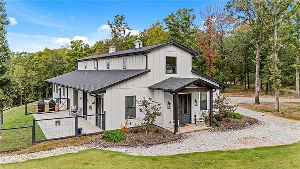 4.23 Acres of Land with Home for Sale in Gravette, Arkansas