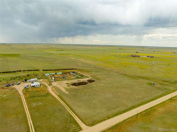 80 Acres of Agricultural Land with Home for Sale in Calhan, Colorado