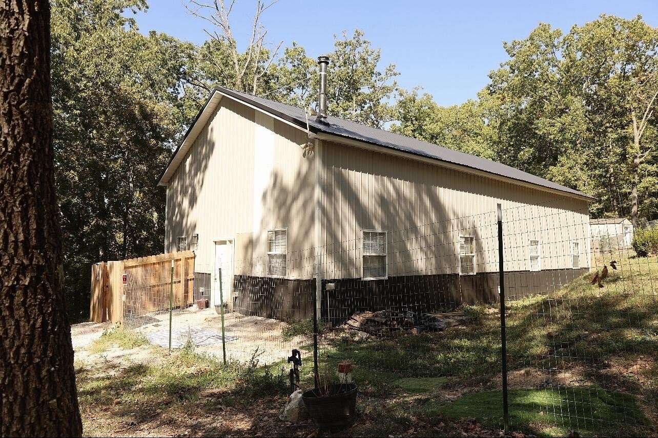 4.72 Acres of Land with Home for Sale in Crane, Missouri