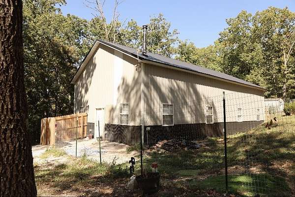 4.72 Acres of Land with Home for Sale in Crane, Missouri