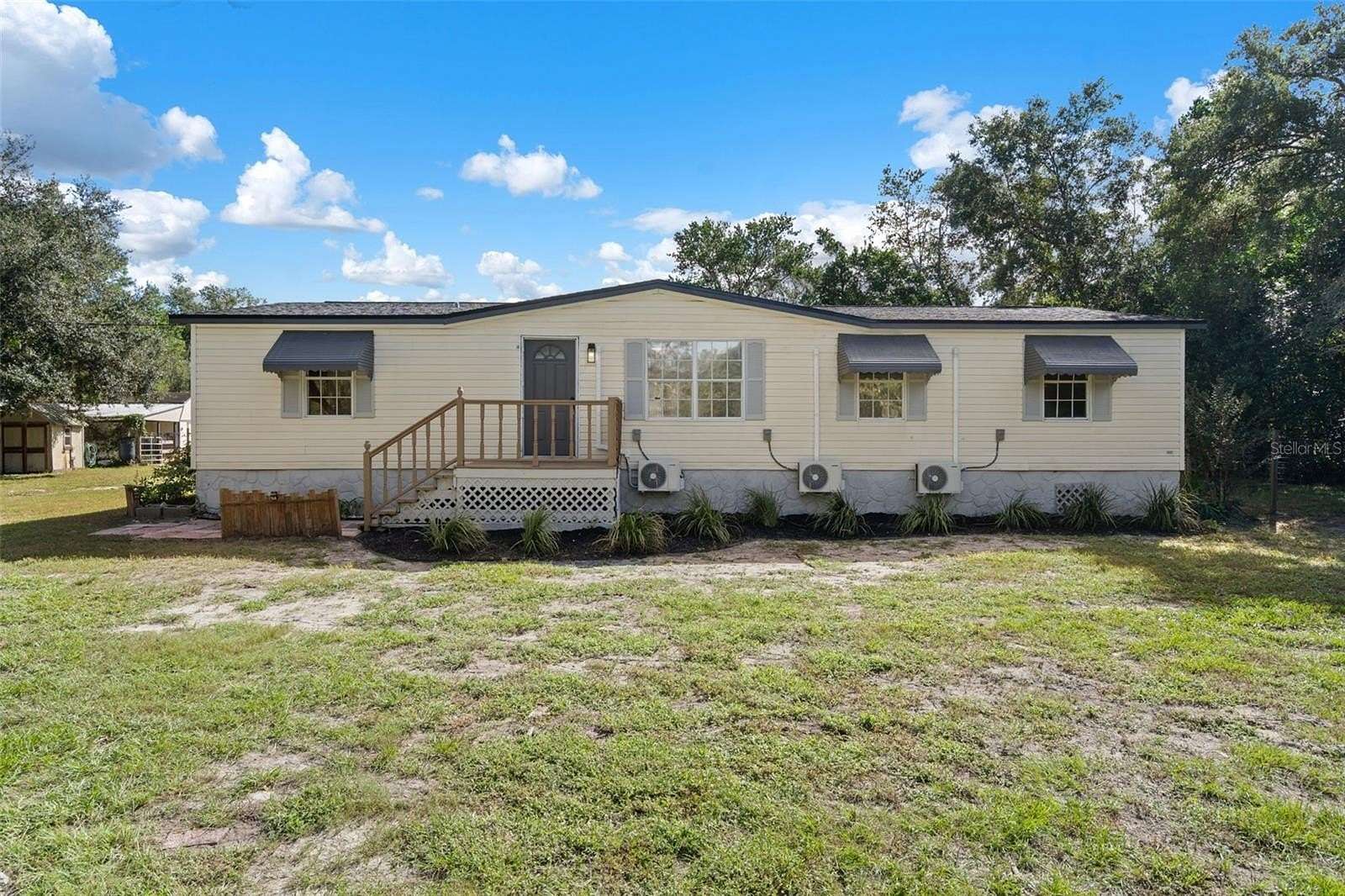 2.5 Acres of Land with Home for Sale in Spring Hill, Florida