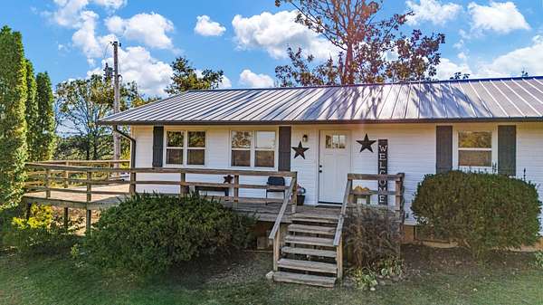 5 Acres of Land with Home for Sale in Moody, Missouri