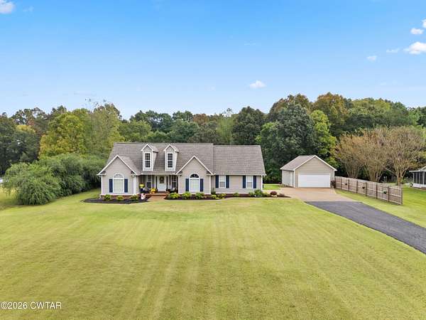 1.69 Acres of Land with Home for Sale in Beech Bluff, Tennessee