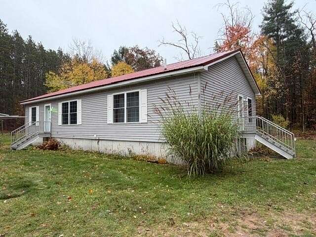 10 Acres of Land with Home for Sale in White Cloud, Michigan