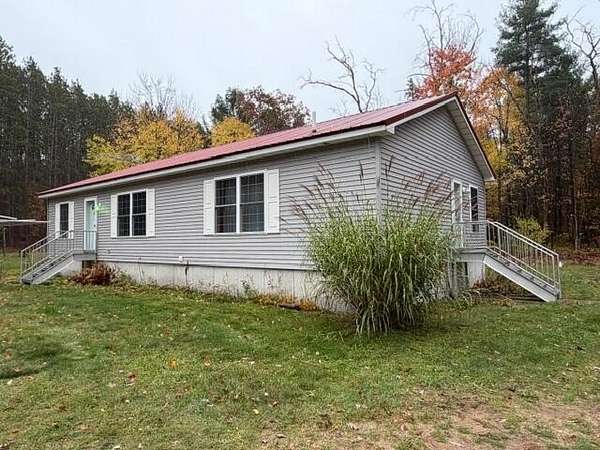 10 Acres of Land with Home for Sale in White Cloud, Michigan