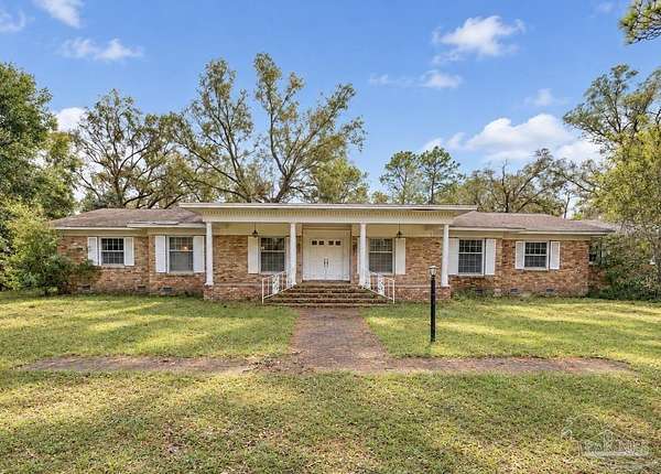 3.5 Acres of Land with Home for Sale in Milton, Florida