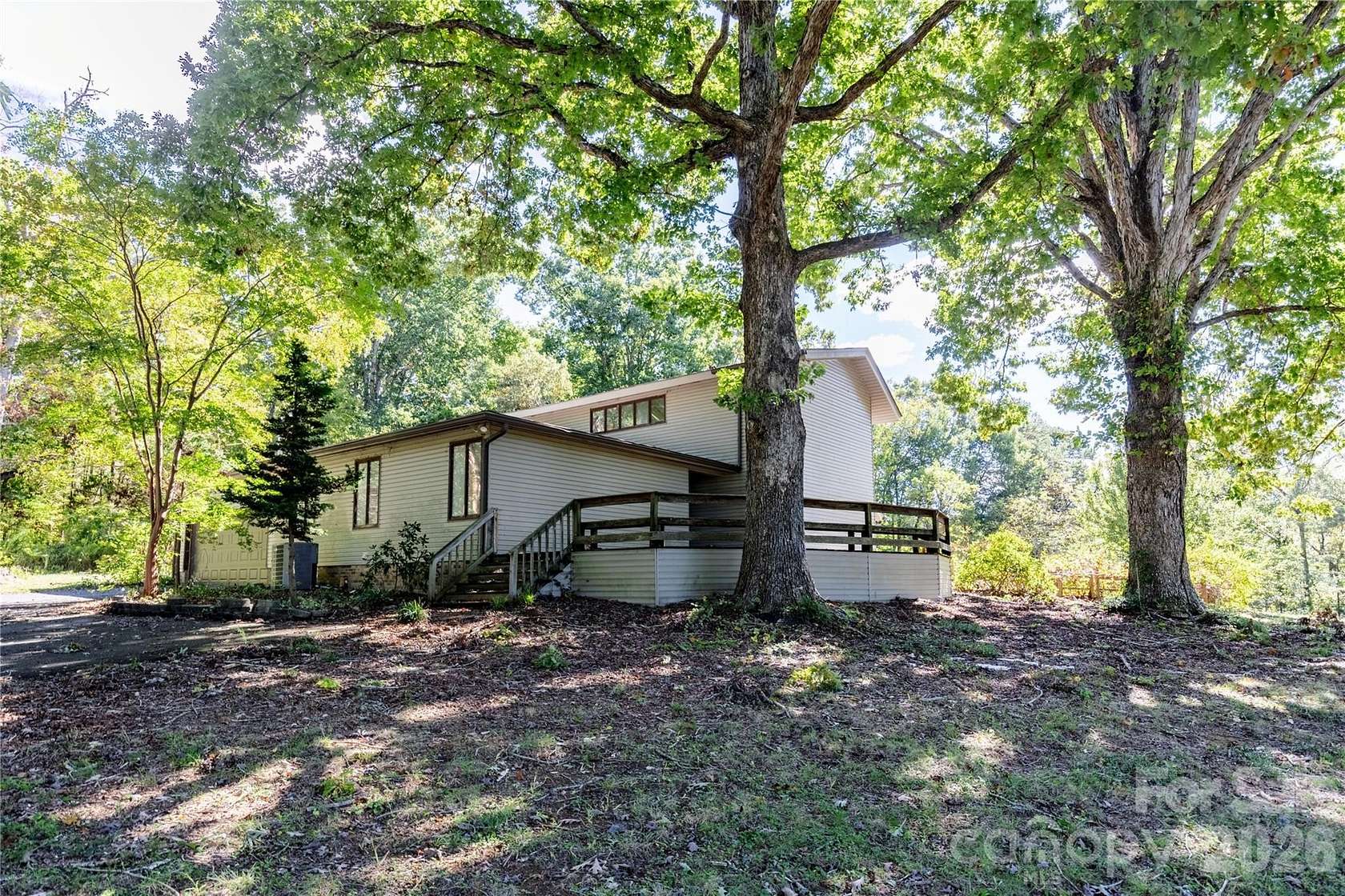 6.49 Acres of Land with Home for Sale in New London, North Carolina