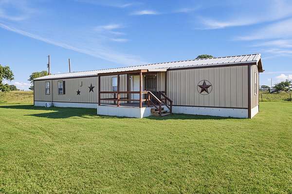 1.5 Acres of Land with Home for Sale in Aquilla, Texas