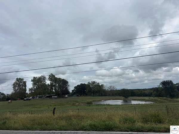 38.6 Acres of Land with Home for Sale in Clinton, Missouri