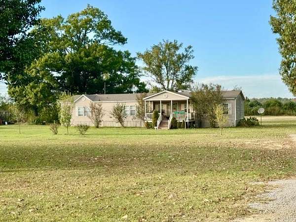 3.8 Acres of Land with Home for Sale in Blue Springs, Mississippi