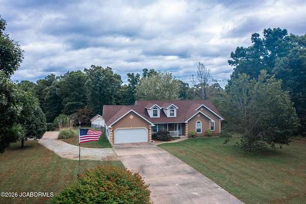 4.36 Acres of Land with Home for Sale in Holts Summit, Missouri