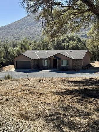 3.89 Acres of Land with Home for Sale in Oakhurst, California