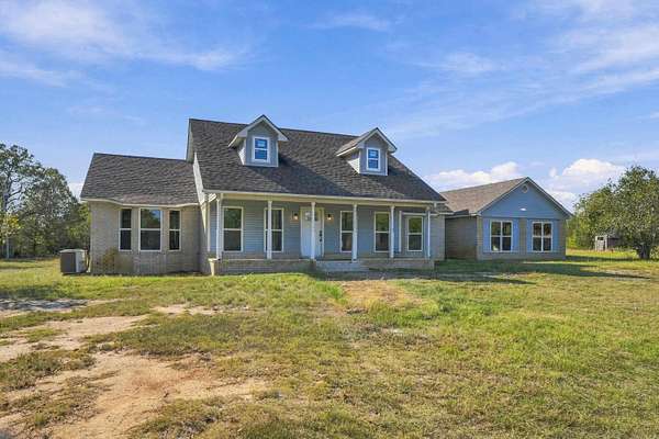 5 Acres of Land with Home for Sale in Romance, Arkansas