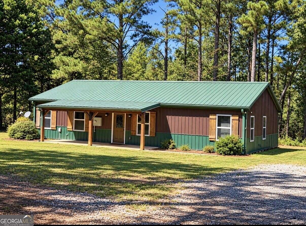 6.54 Acres of Land with Home for Sale in Jackson, Georgia