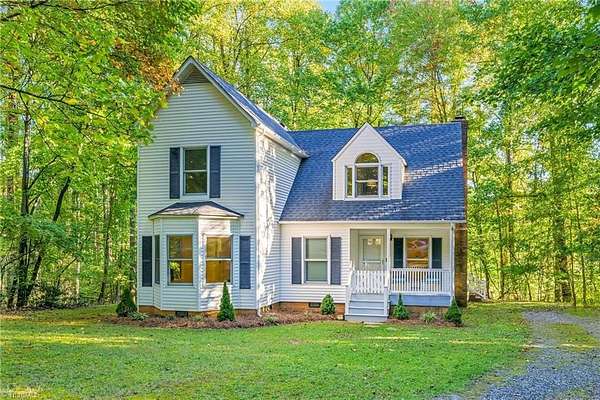3.24 Acres of Land with Home for Sale in Moravian Falls, North Carolina
