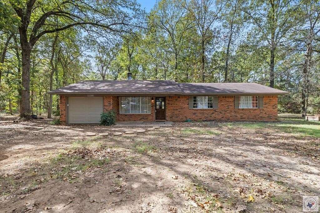 5 Acres of Land with Home for Sale in Atlanta, Texas