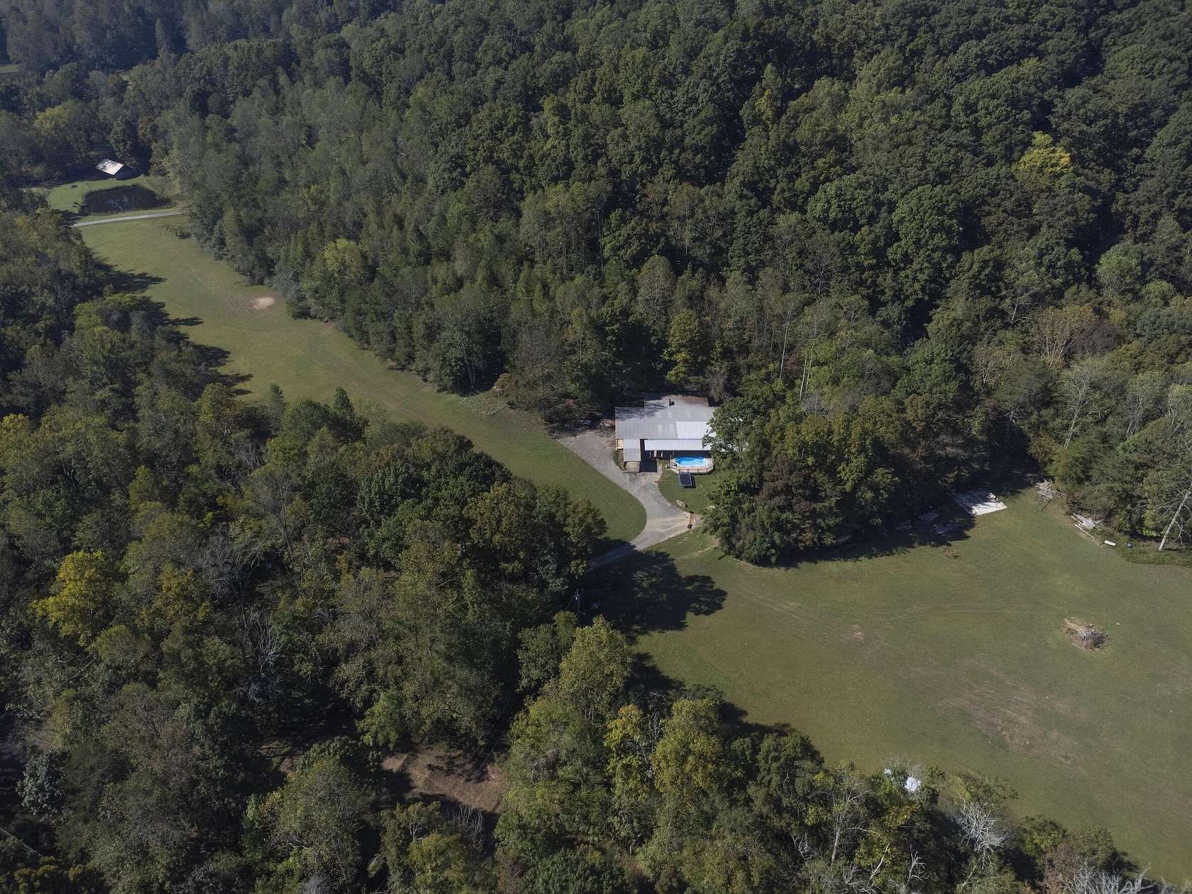 56.3 Acres of Land with Home for Sale in McDonald, Tennessee