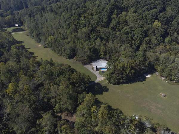56.3 Acres of Land with Home for Sale in McDonald, Tennessee