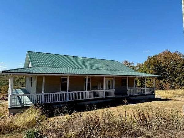 182 Acres of Land with Home for Sale in Mountain Grove, Missouri