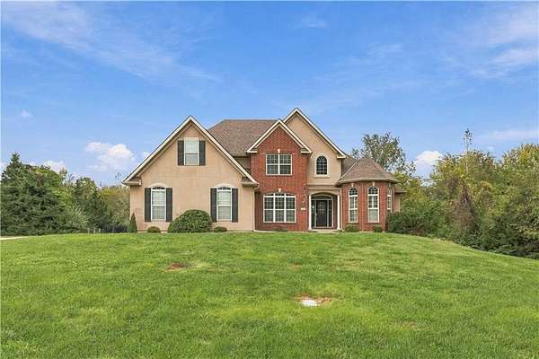 1.87 Acres of Land with Home for Sale in Blue Springs, Missouri
