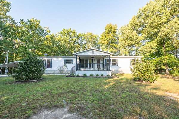 7.4 Acres of Land with Home for Sale in Dunlap, Tennessee