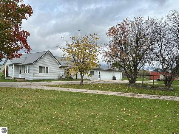 7 Acres of Land with Home for Sale in Riverdale, Michigan