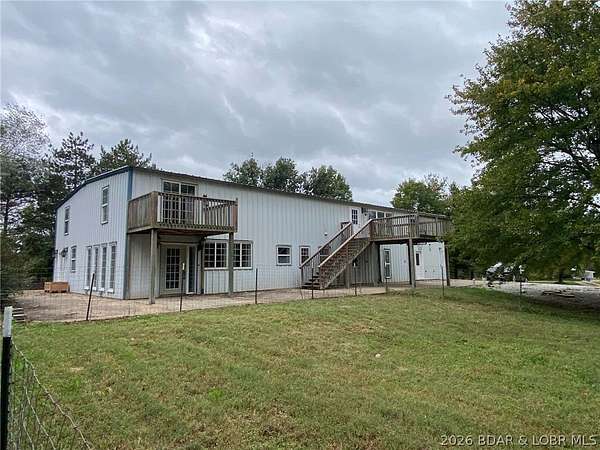 40 Acres of Agricultural Land with Home for Sale in California, Missouri
