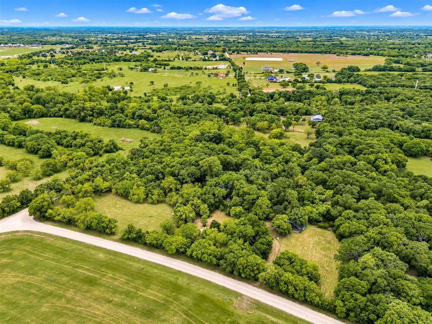 13.2 Acres of Land with Home for Sale in Grandview, Texas