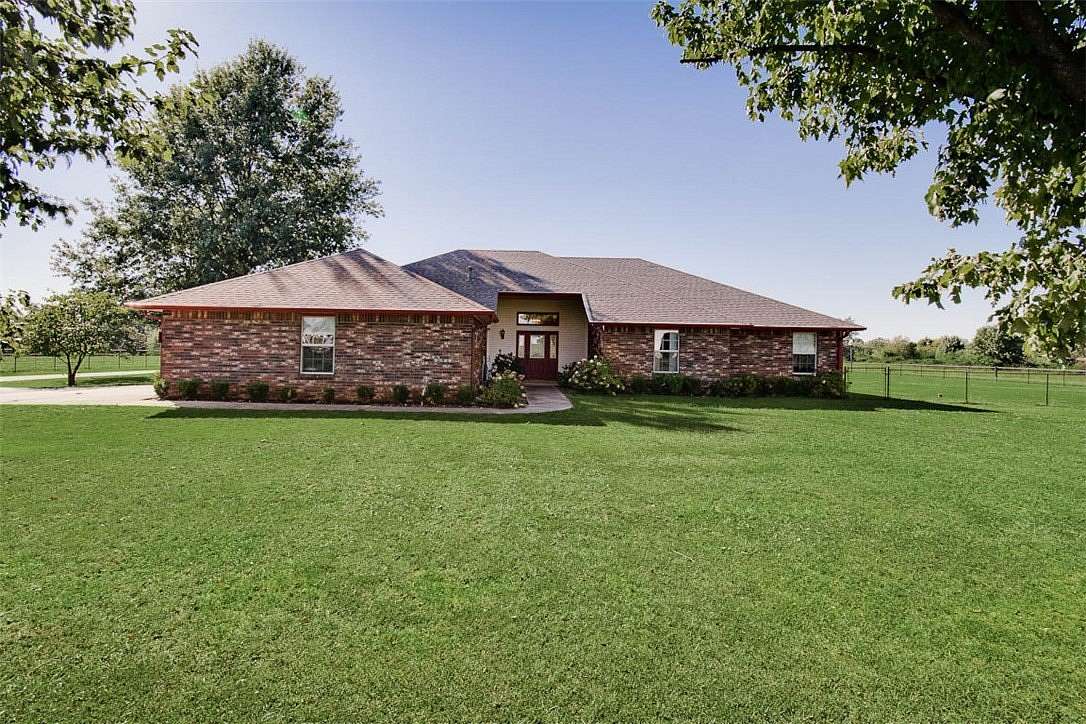 6 Acres of Land with Home for Sale in Elm Springs, Arkansas