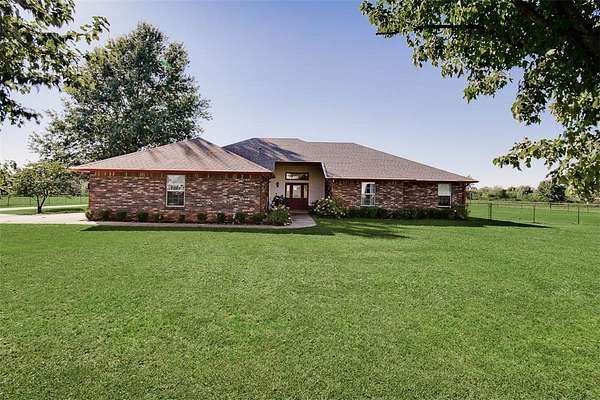 6 Acres of Land with Home for Sale in Elm Springs, Arkansas
