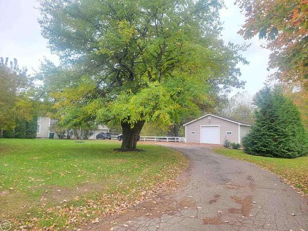 2.34 Acres of Land with Home for Sale in Holly, Michigan