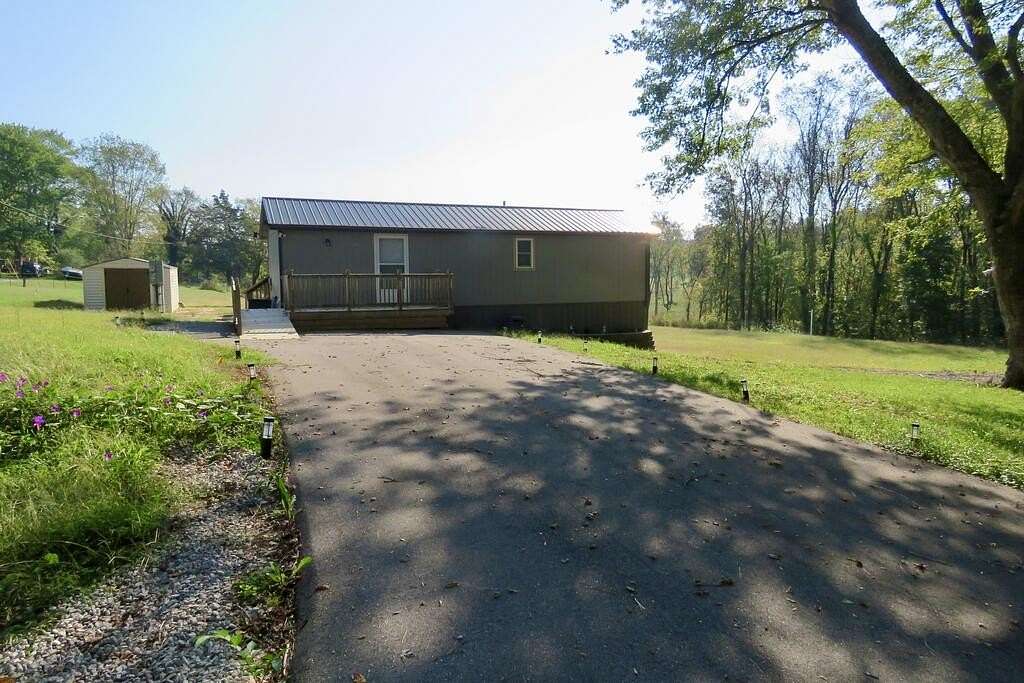 1.4 Acres of Land with Home for Sale in Sparta, Tennessee