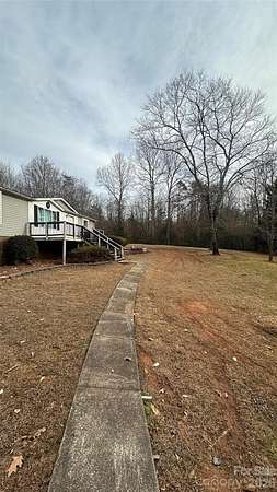 1.75 Acres of Land with Home for Sale in Olin, North Carolina