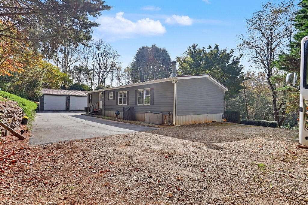 1.57 Acres of Land with Home for Sale in Otto, North Carolina