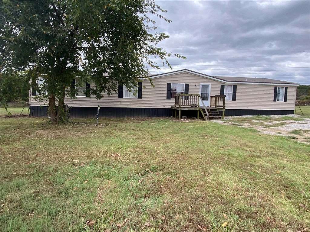 2.52 Acres of Land with Home for Sale in Green Forest, Arkansas