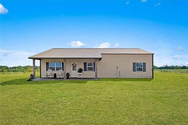 5 Acres of Land with Home for Sale in Green Forest, Arkansas