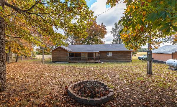 10.4 Acres of Land with Home for Sale in Lebanon, Missouri