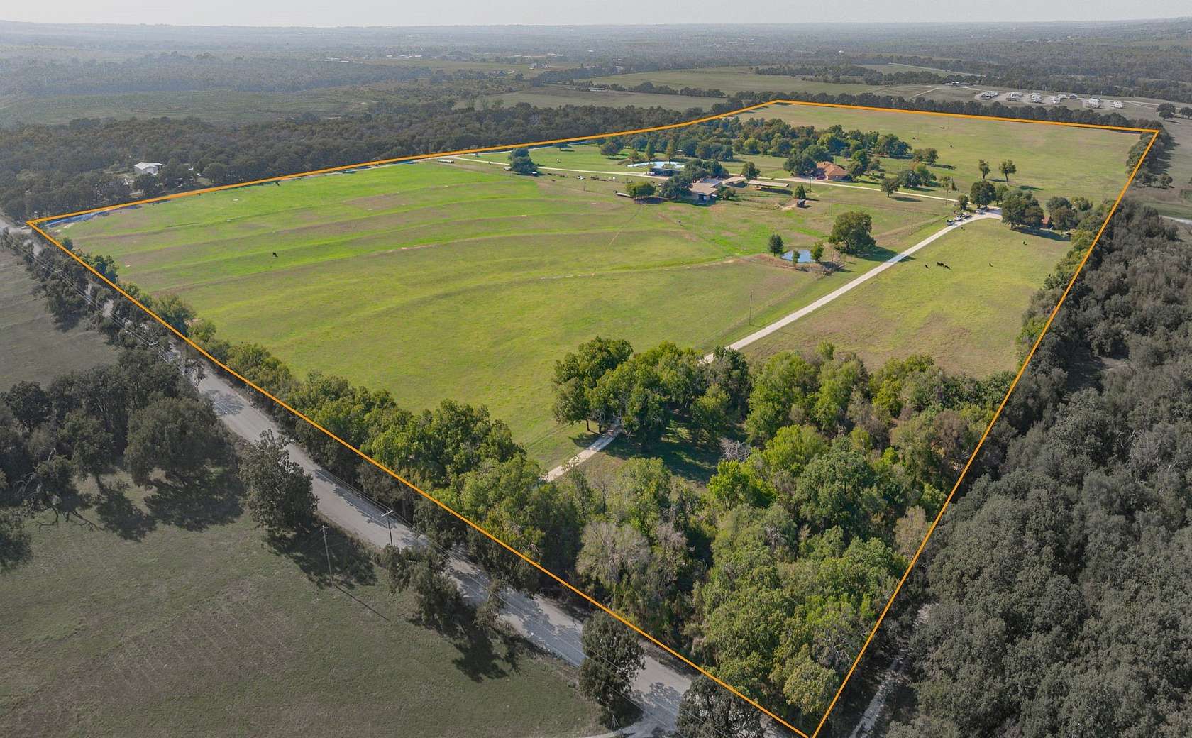 85.3 Acres of Agricultural Land with Home for Sale in Stephenville, Texas